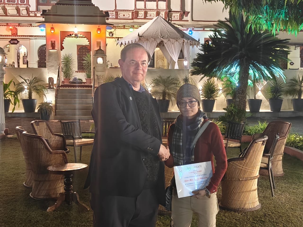 Professor Nigel Mason presenting award